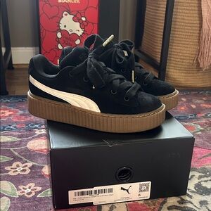 Puma Fenty Black Suede Sneakers with White Stripe and Gum Platform
